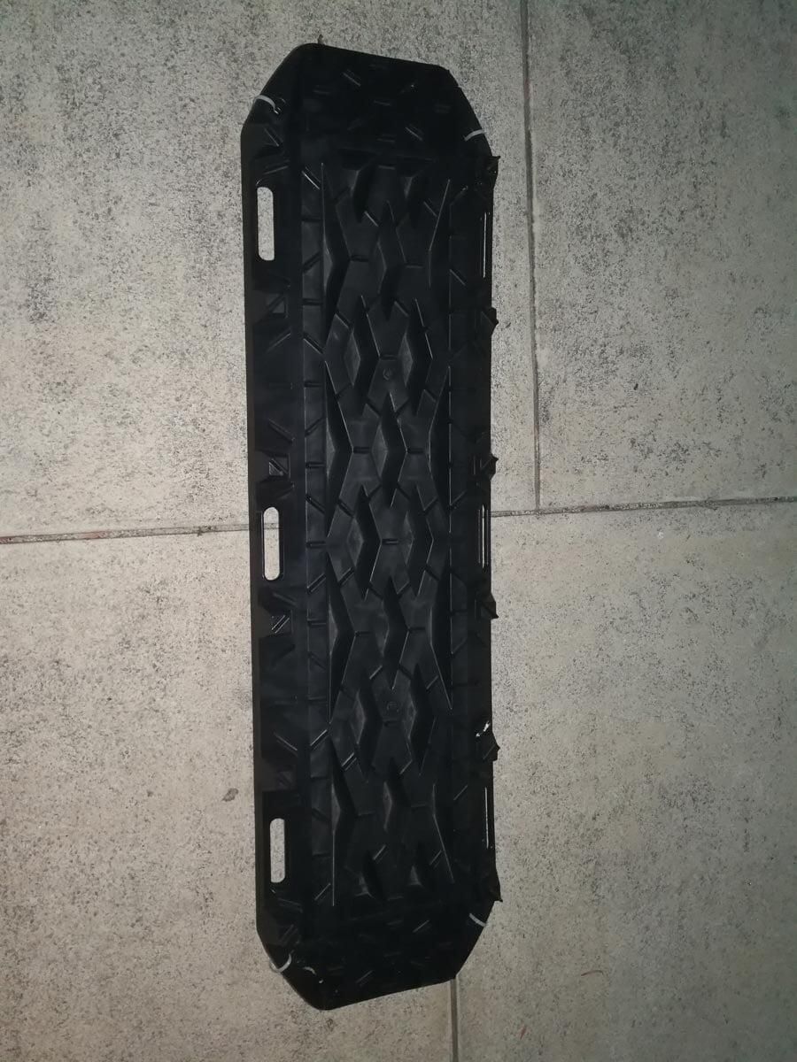 A Black Tire Is Sitting On A Tiled Floor — TJM Dubbo In Dubbo, NSW