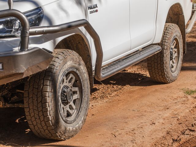 A White Truck is Parked on a Dirt Road — TJM Dubbo In Dubbo, NSW