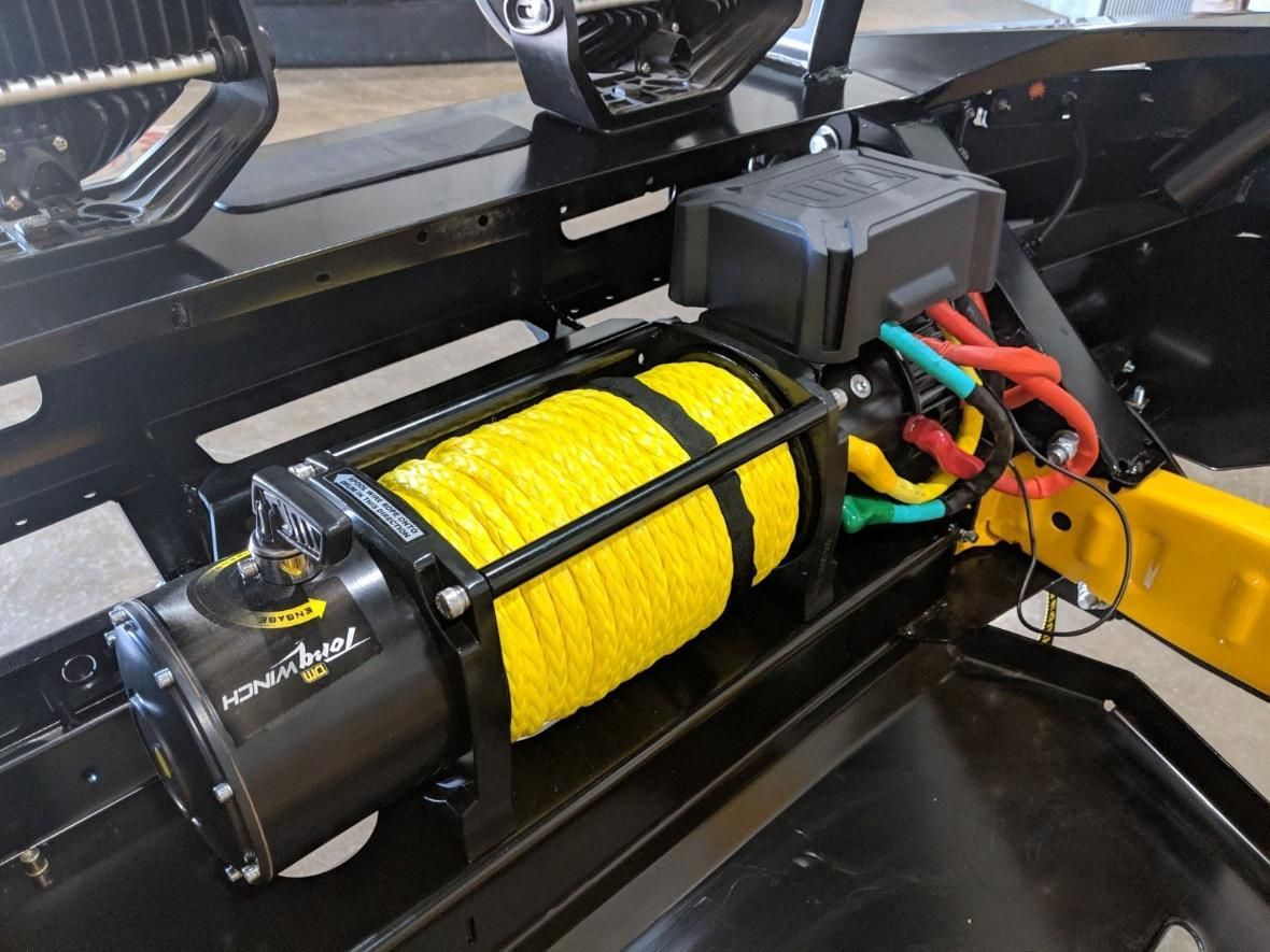 A Yellow Winch Is Attached To The Front Of A Vehicle — TJM Dubbo In Dubbo, NSW