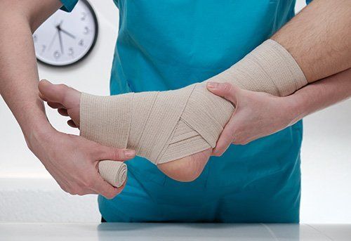 Bandaging Foot of A Patient — Pensacola, FL — Pensacola Podiatry P.A.