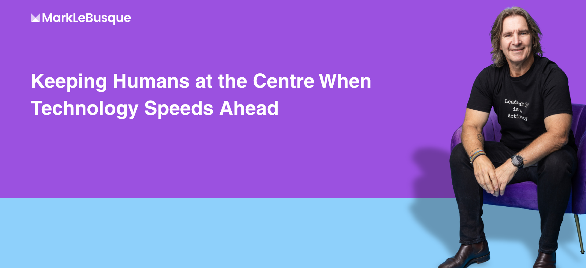 Image of Mark sitting in a chair looking out to the audince 