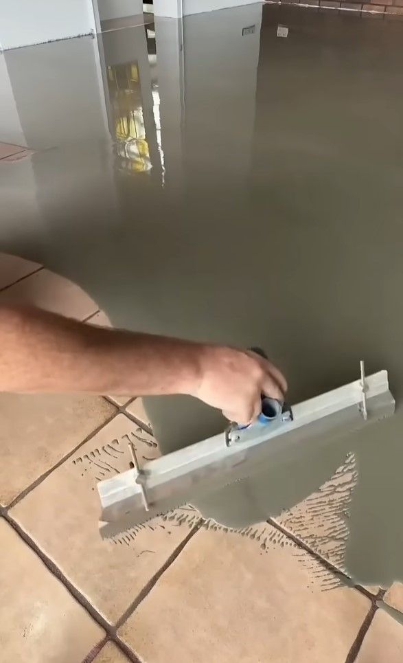 beige green epoxy flooring coat over tiles