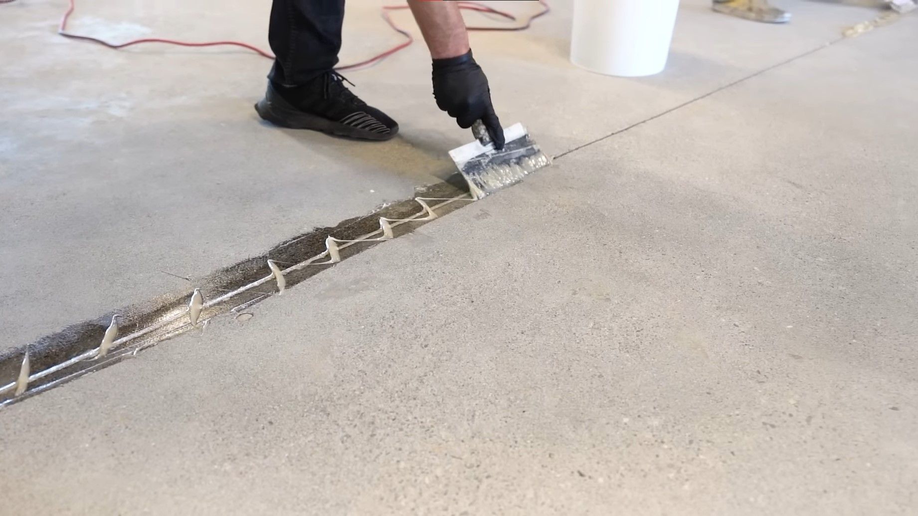 patching up concrete cracks and line gaps