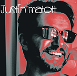 A man wearing sunglasses and the name justin matott