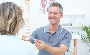Smiling Physiotherapist — Chiropractic in Shermans Dale, PA