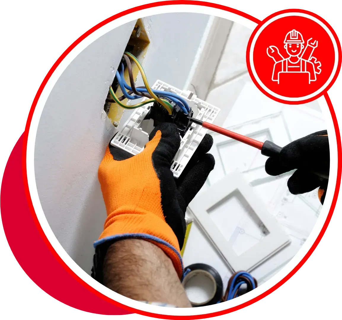 Electrician working on electrical wiring in a wall, wearing safety gloves, screwdriver in hand.