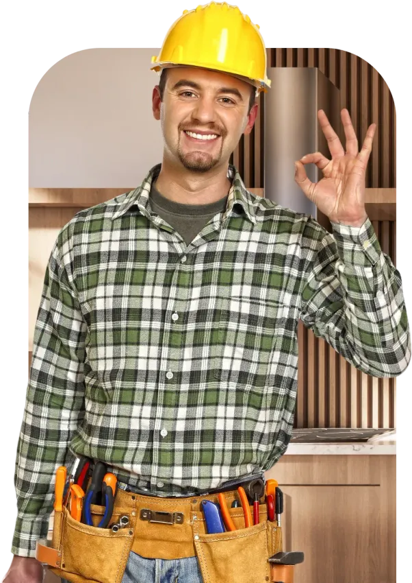 Man with tool belt giving a thumbs up in a kitchen.