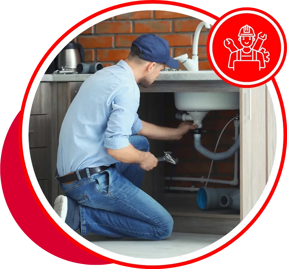 Plumber kneeling, repairing pipes under a sink; red circle with tools icon in the corner.