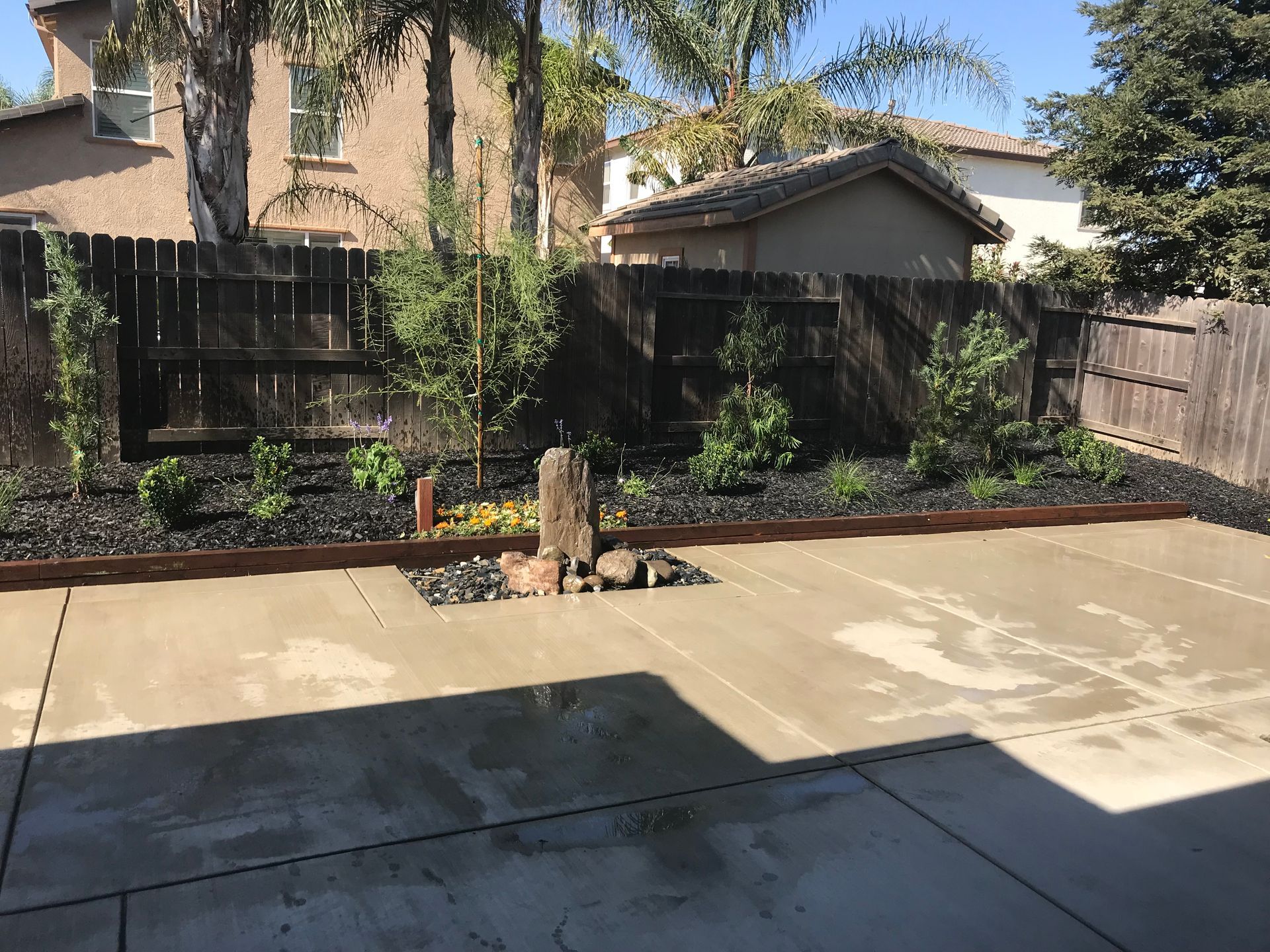 A house with a concrete walkway leading to it