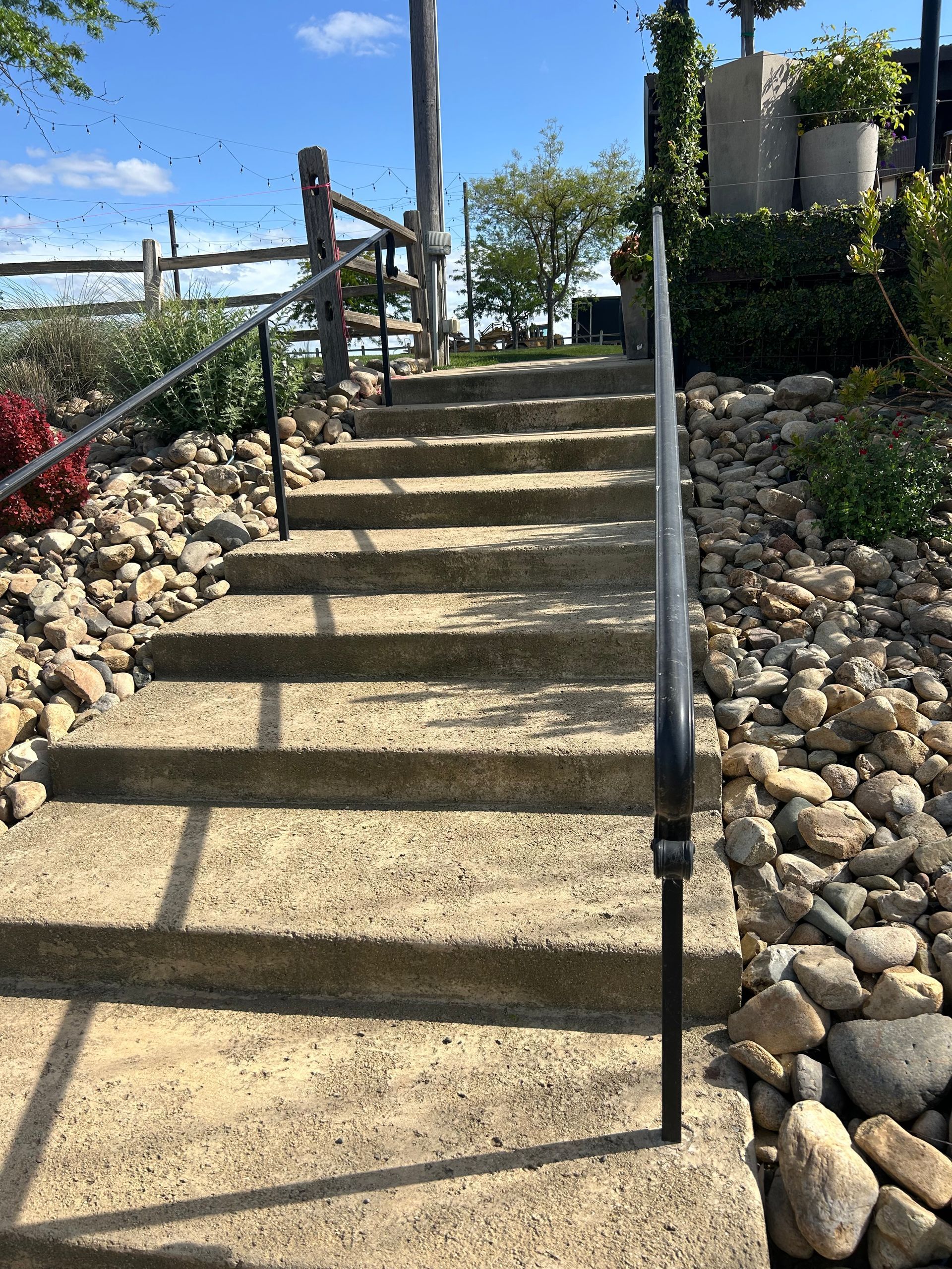 A set of stairs leading up to a rocky hillside