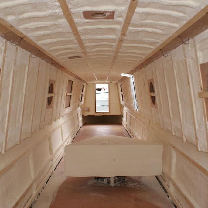 The inside of a boat that is being built