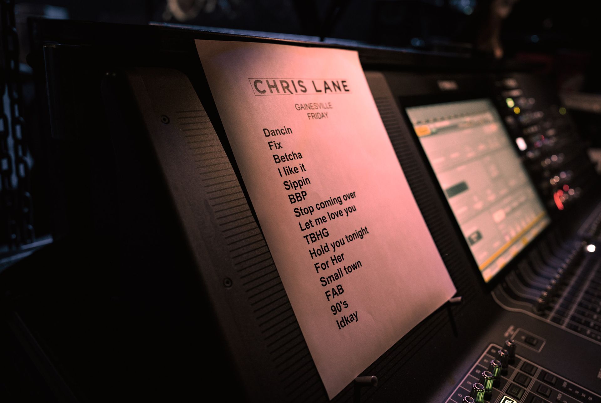A list of songs written on a piece of paper titled chris lane