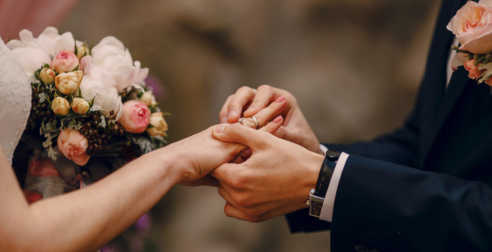 Couple discussing wedding venue options with a consultant