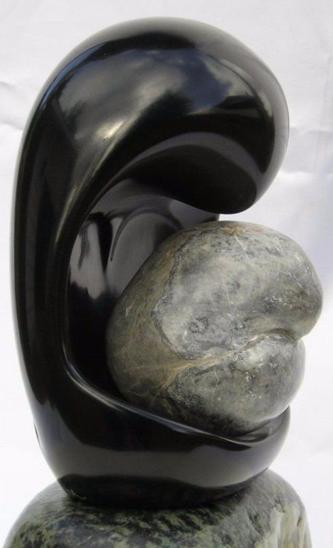Stone Sculpture: Chlorite, Fossilized Coral with Soapstone base