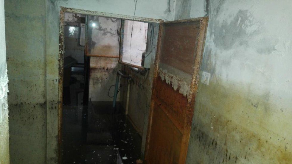 interni magazzino allagato