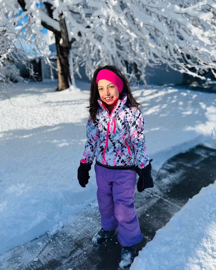 Little Girl In Snow