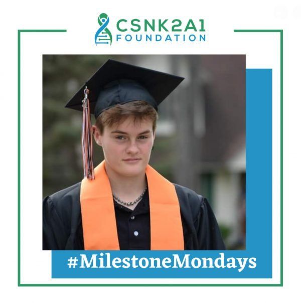 A picture of a young man in a graduation cap and gown