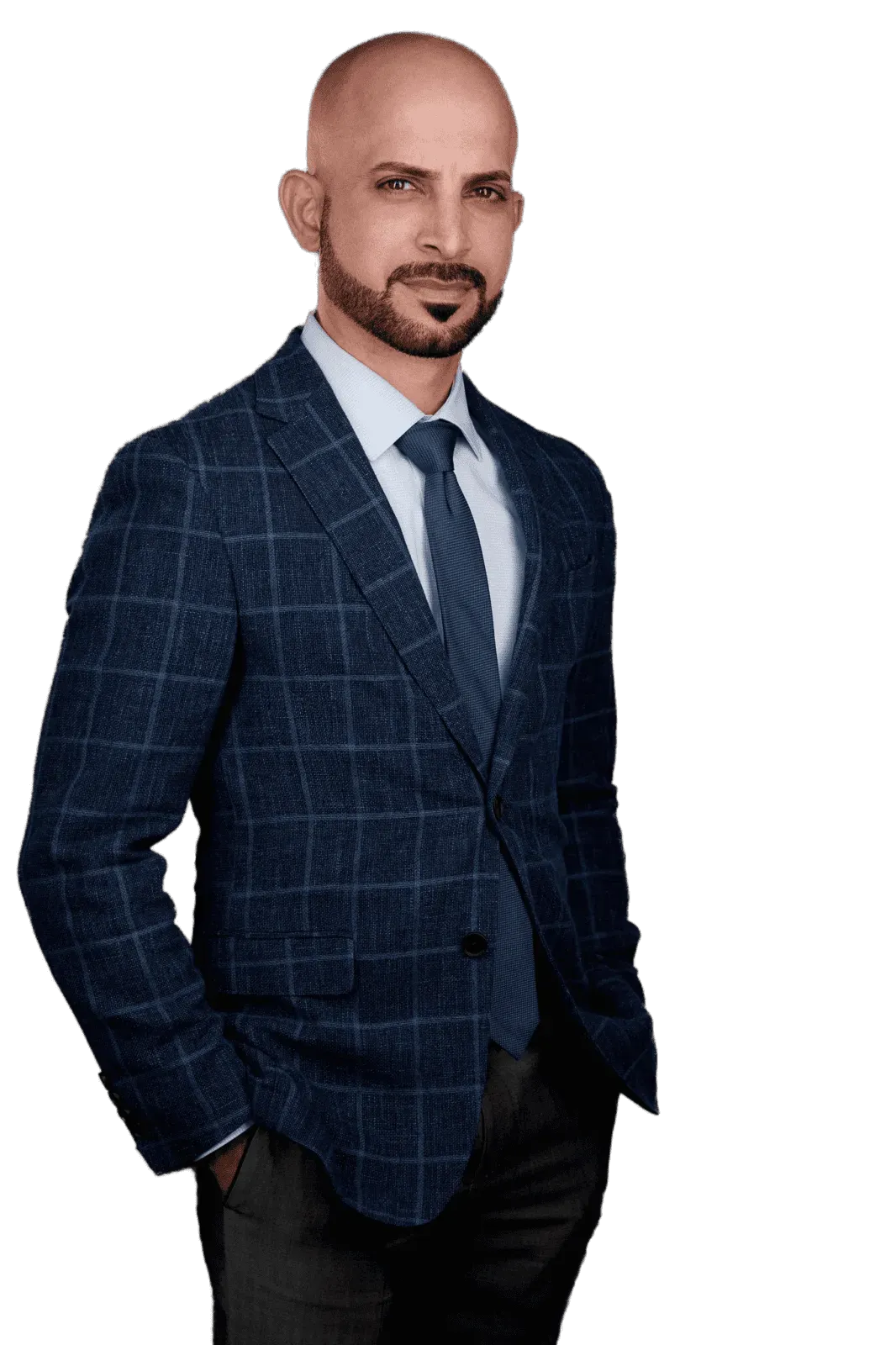 A man in a suit and tie is standing with his hands in his pockets.