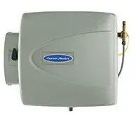 Gray wall-mounted air conditioner unit with a small side pipe and blue logo