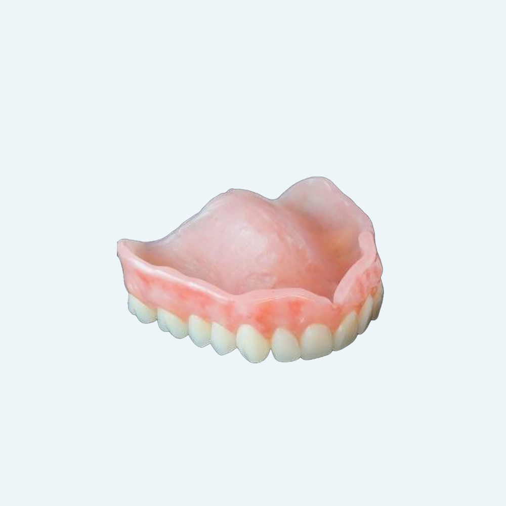 A set of dentures with pink gum-colored base and white teeth.