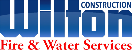 The logo for wilton construction fire and water services