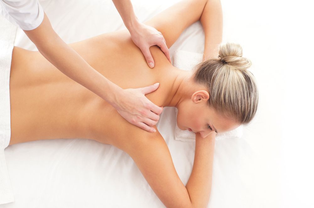 Woman Receiving a Back Massage — R & R Relaxation and Remedial In Evans Head, NSW