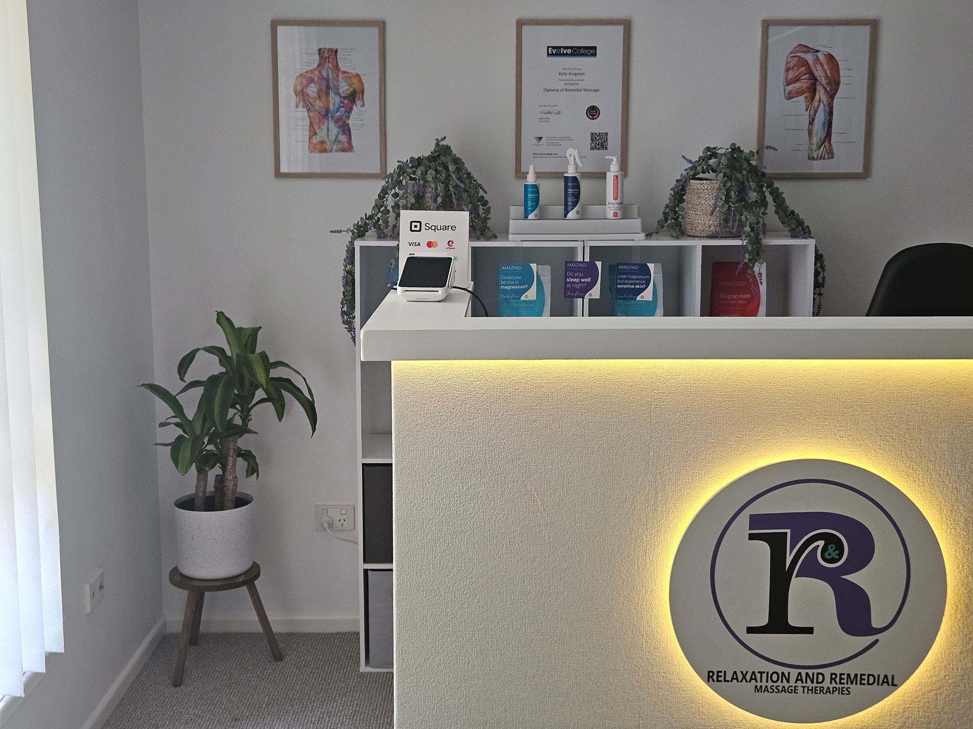 Reception Desk with Logo — R & R Relaxation and Remedial In Yamba, NSW