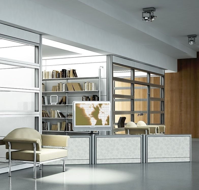 Una moderna hall d'ufficio con una poltrona chiara, un monitor a parete che mostra una mappa del mondo e scaffali pieni di libri.