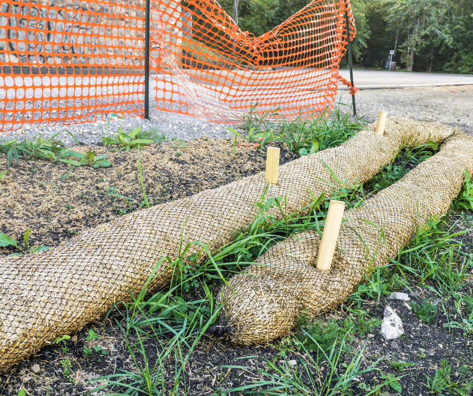 Straw wattle installation in San Diego backyard remodel for slope support and erosion prevention