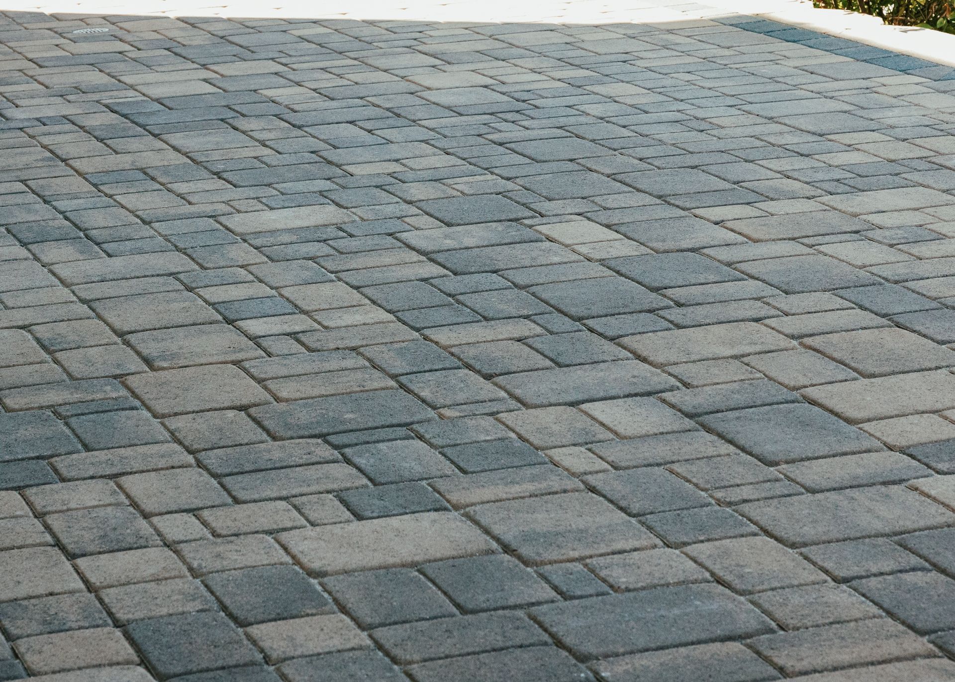 Modern paver patio installed by professional San Diego landscapers, featuring durable and stylish design.