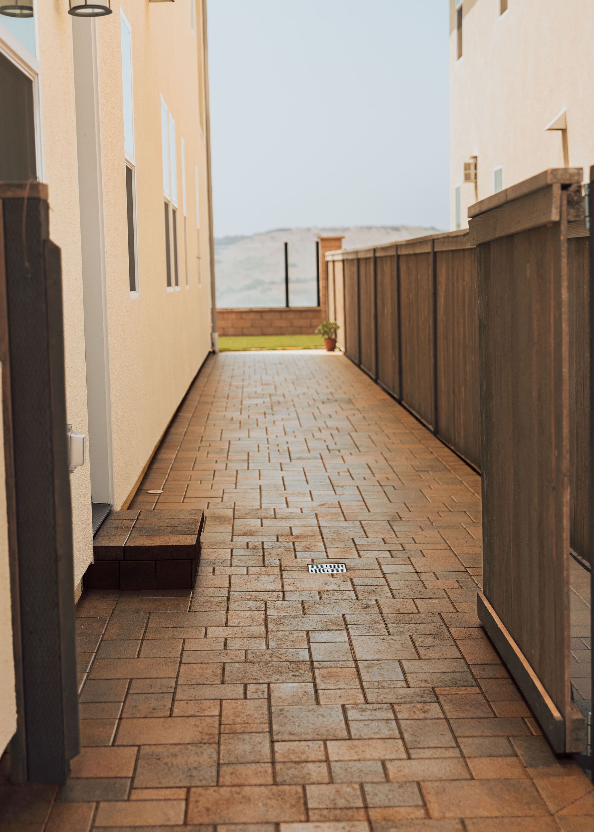 Custom paver walkway installation for a San Diego residential landscape