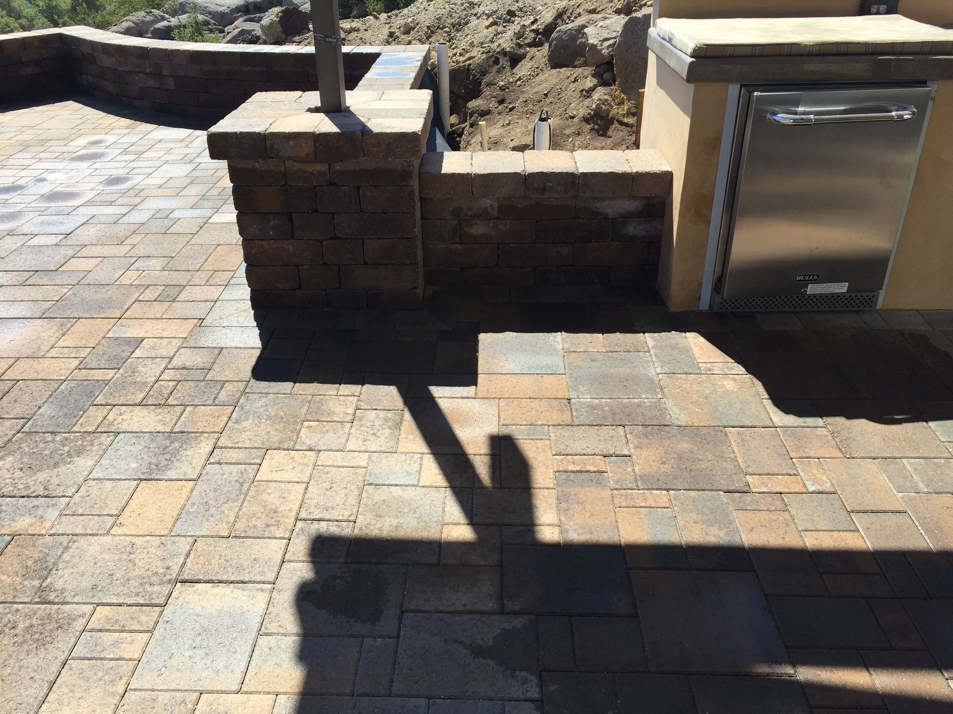 Modern outdoor kitchen with turf, perfect for Spring Valley BBQs