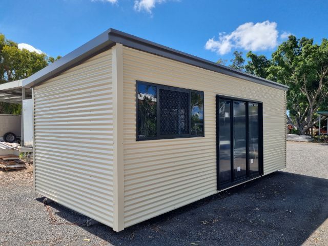 Container House Under Construction with Trees on Either Side — Bundy Tiny Homes and Carports in Branyan, QLD