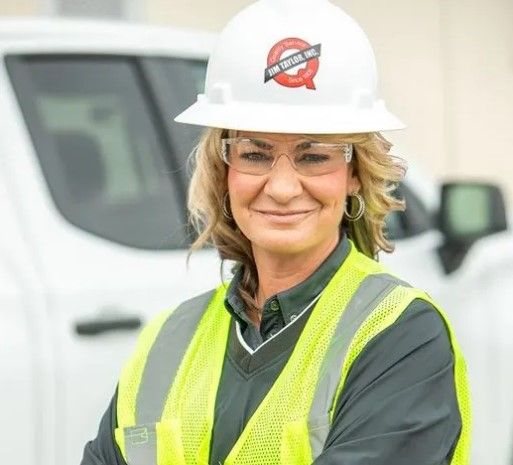 Julia yank president of taylor Roofing