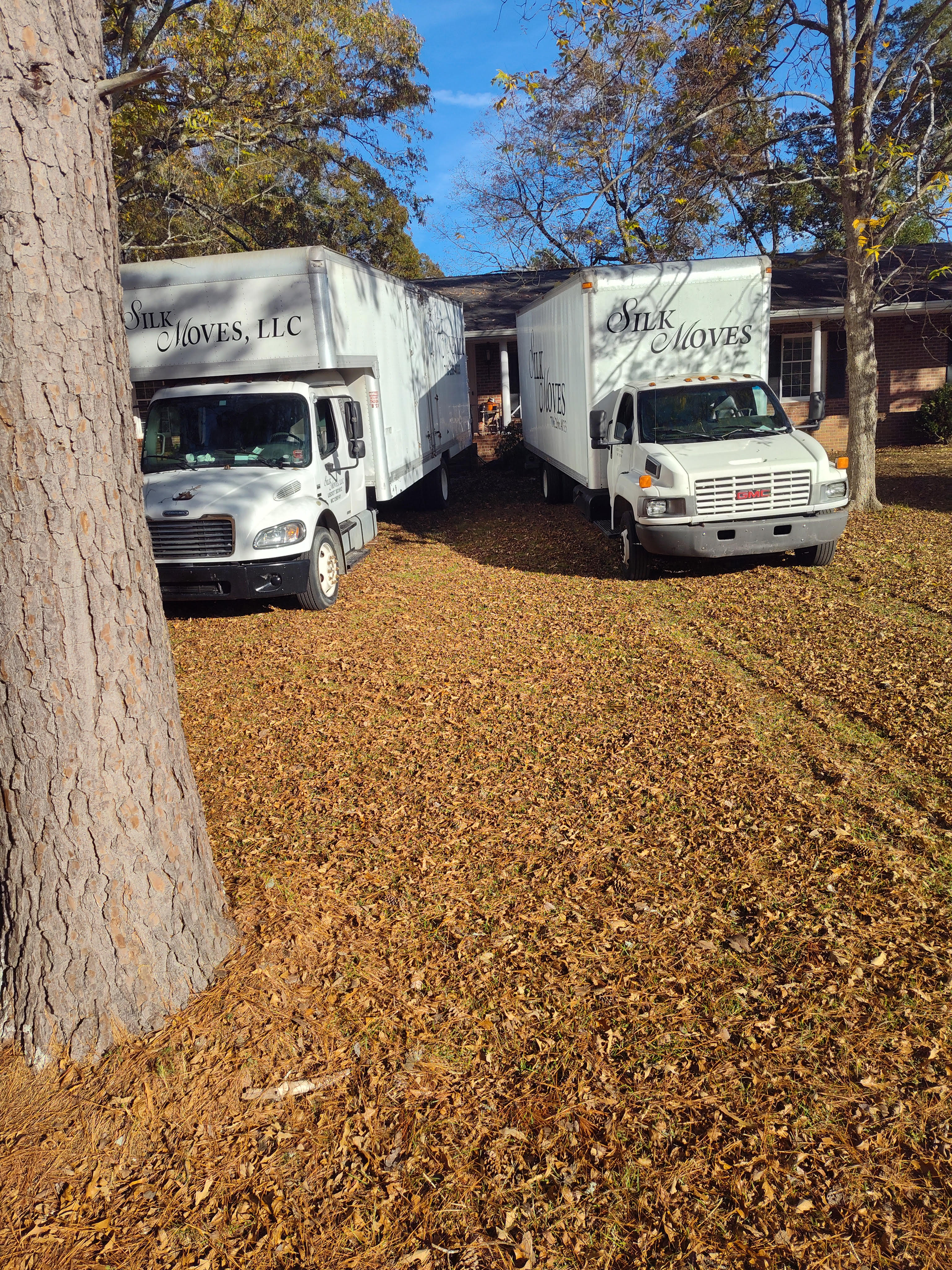 Two Silk Move Trucks