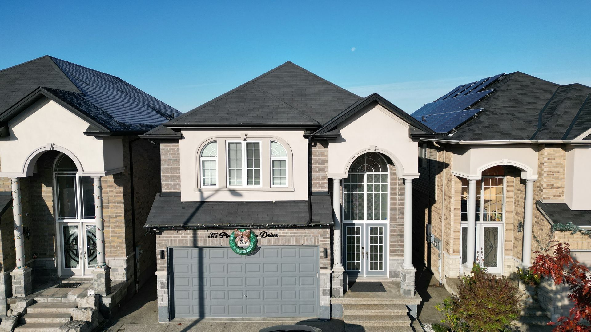 A house with a wreath on the front of it