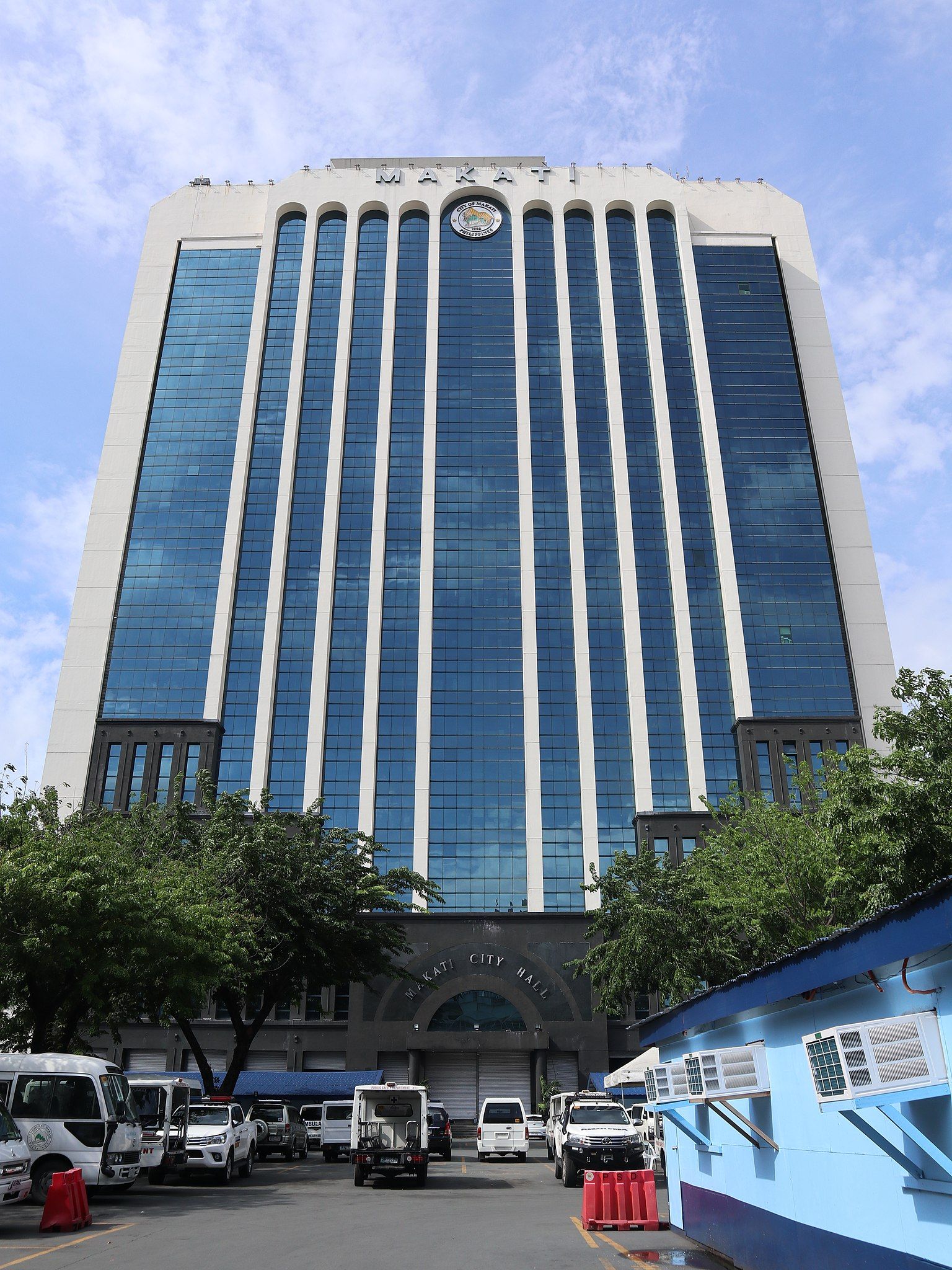Makati City Hall's modern architecture, a prominent landmark near Y2 Residence Hotel's prime location