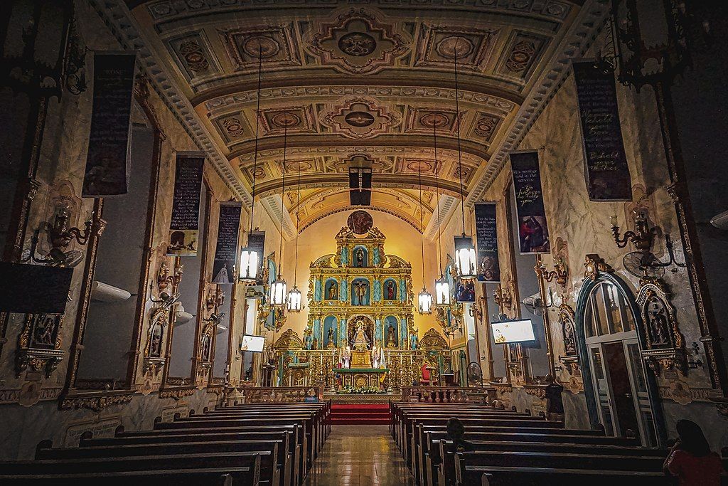 Ornate interior of San Antonio de Padua Church, a historic landmark near Y2 Residence Hotel Makati