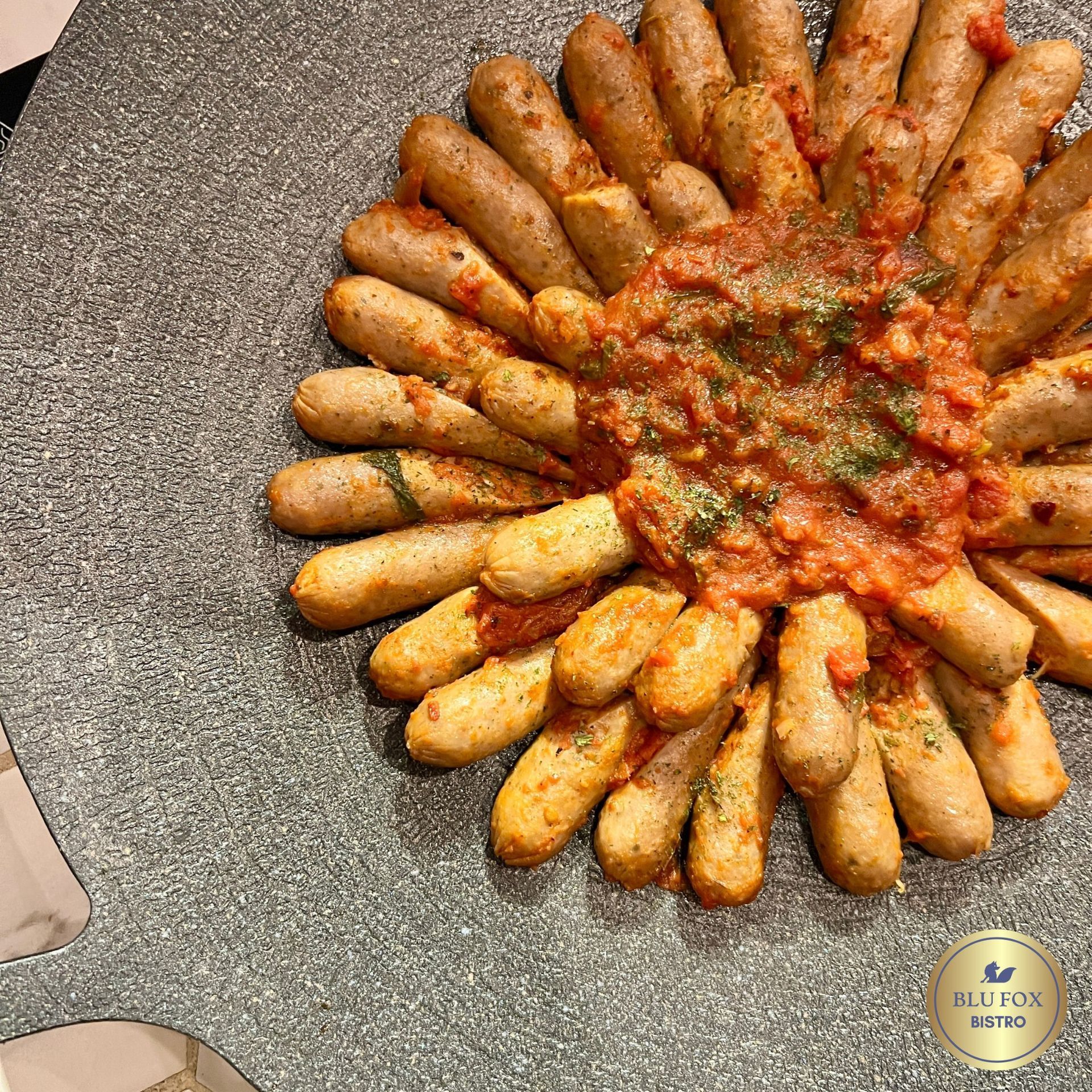 Blu Fox Bistro A shareable platter of sausages from the Y2 Residence Hotel, showing a great food choice for your staycation in Makati.