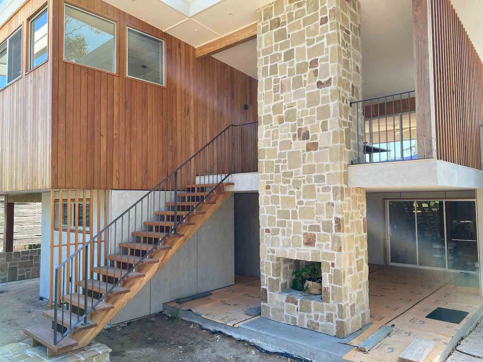 A Wooden Staircase Leading Up to the Second Floor of a House —  SCF Industries Pty Ltd in Albion Park Rail, NSW