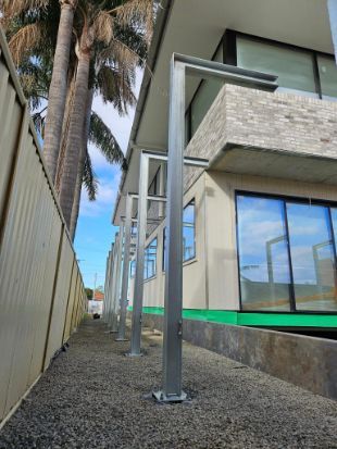 A Building Under Construction With a Trees in the Background —  SCF Industries Pty Ltd in Albion Park Rail, NSW