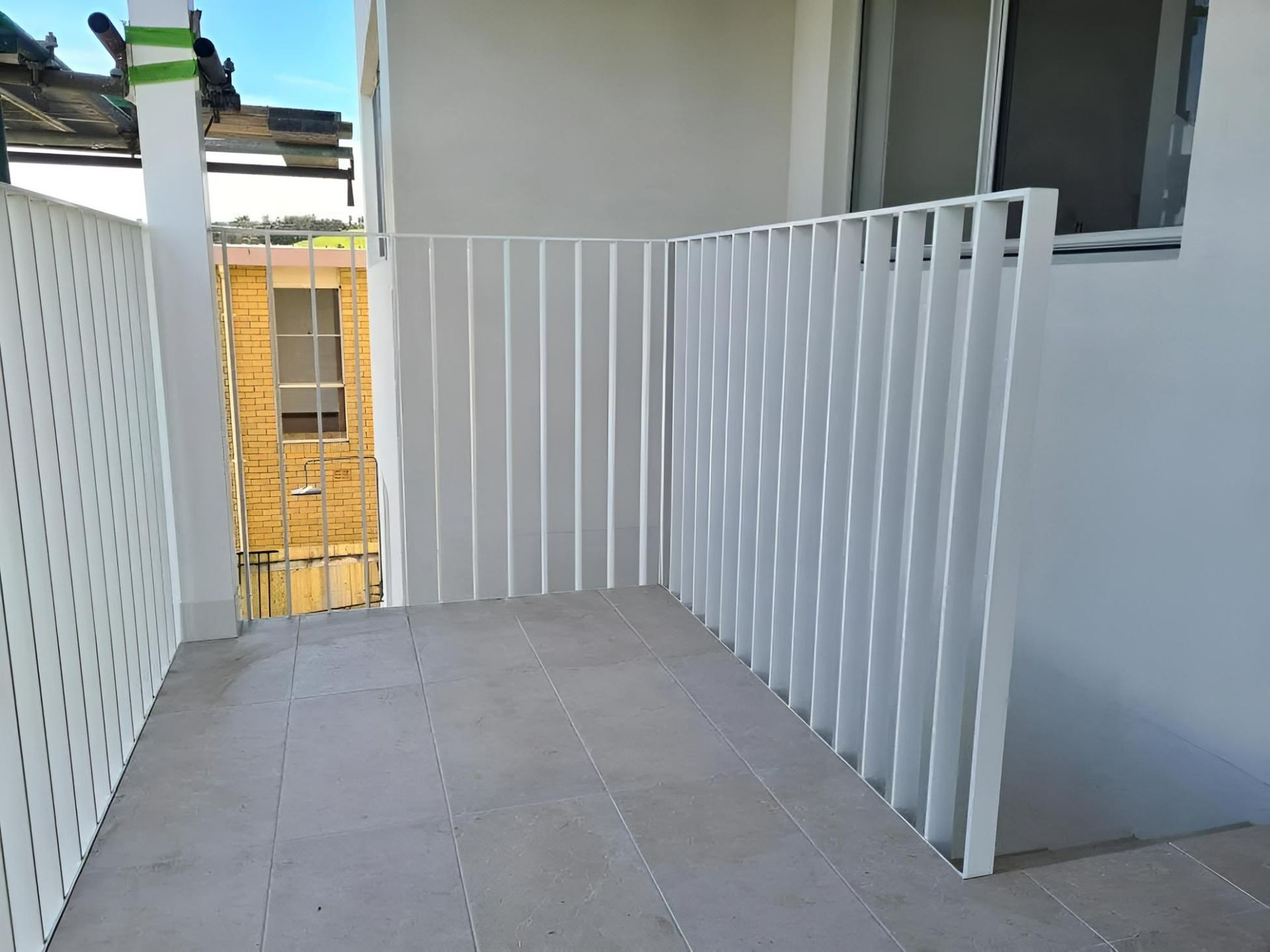 A Balcony With a White Railing and a Window —  SCF Industries Pty Ltd in Albion Park Rail, NSW