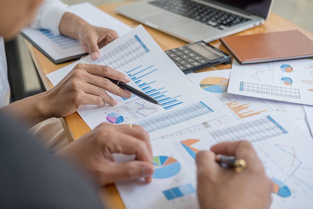 Business Adviser Analyzing Financial Figures — Integrity Bookkeeping Mobile Services in Yamba