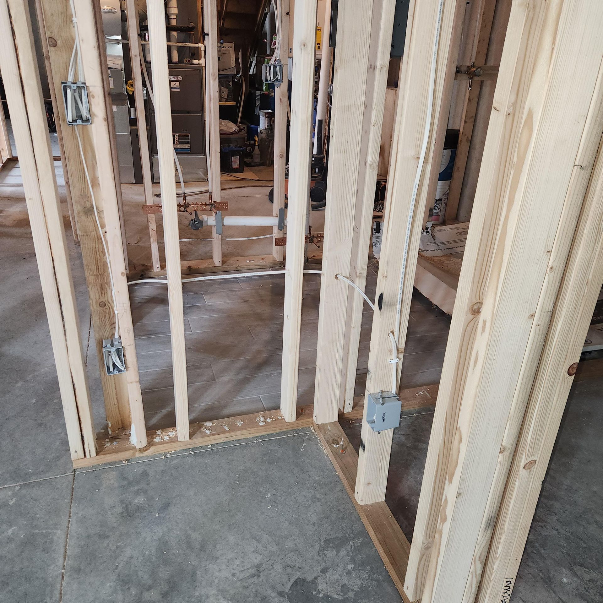A wooden frame of a building under construction