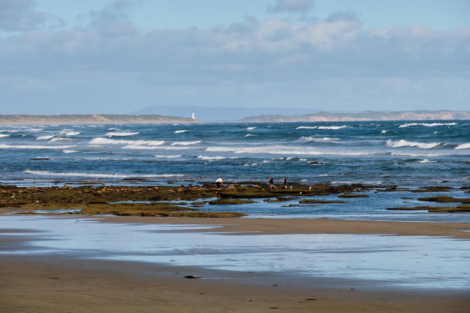 Rough Ocean Waves Crashing Over a Rocky Shore — Ryphen Electrical in Ocean Grove, VIC