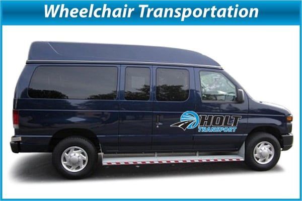 Blue wheelchair-accessible van with side door, Holt Transport logo.  
