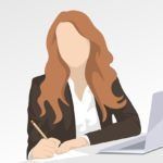 A professional figure with long hair wearing a blazer, writing at a desk with a laptop nearby.