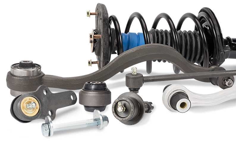 Un montón de diferentes tipos de piezas de suspensión sobre un fondo blanco.