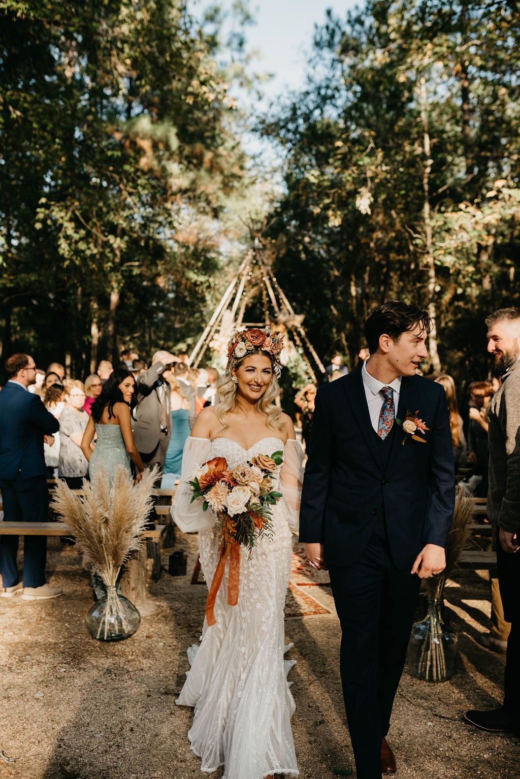 Experience the romantic allure of Nem & Kat's fairy tale wedding amidst towering pine trees and enchanting Tipis at The Shire in Huntsville, Texas. Dive into a truly magical photographic journey with Dear Juliets Photography