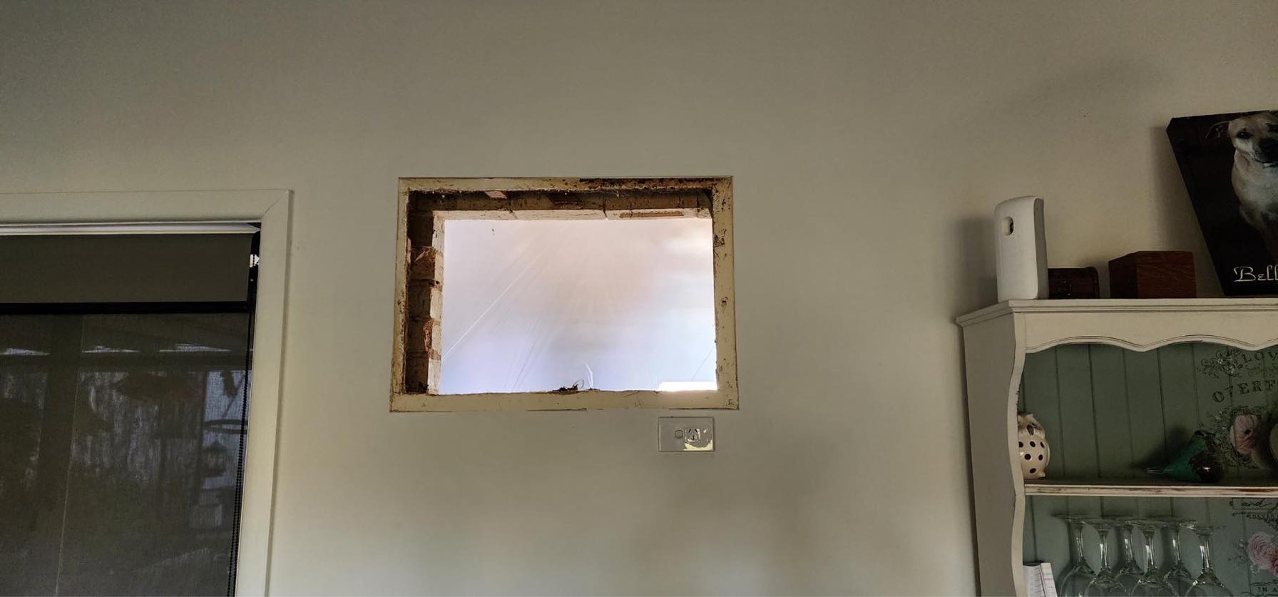 This is a before picture of an air-conditioning hole that is about to get fixed in Golden Gully in the bendigo area